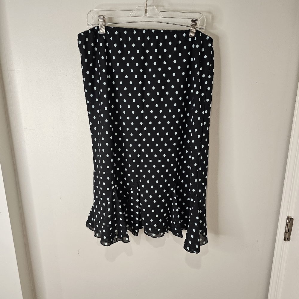 Worthington black skirt with light blue polka in a size 16